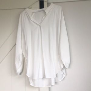 Women’s cram/white blouse